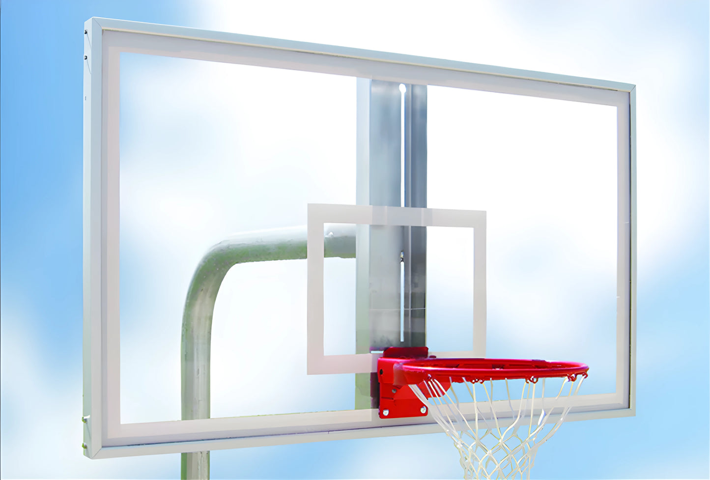 FIRST TEAM basketball hoop with clear basketball backboard and red rim mounted on metal pole