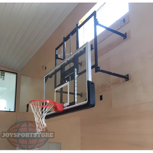 Gared basketball backboard mounted indoors with clear acrylic surface and red rim