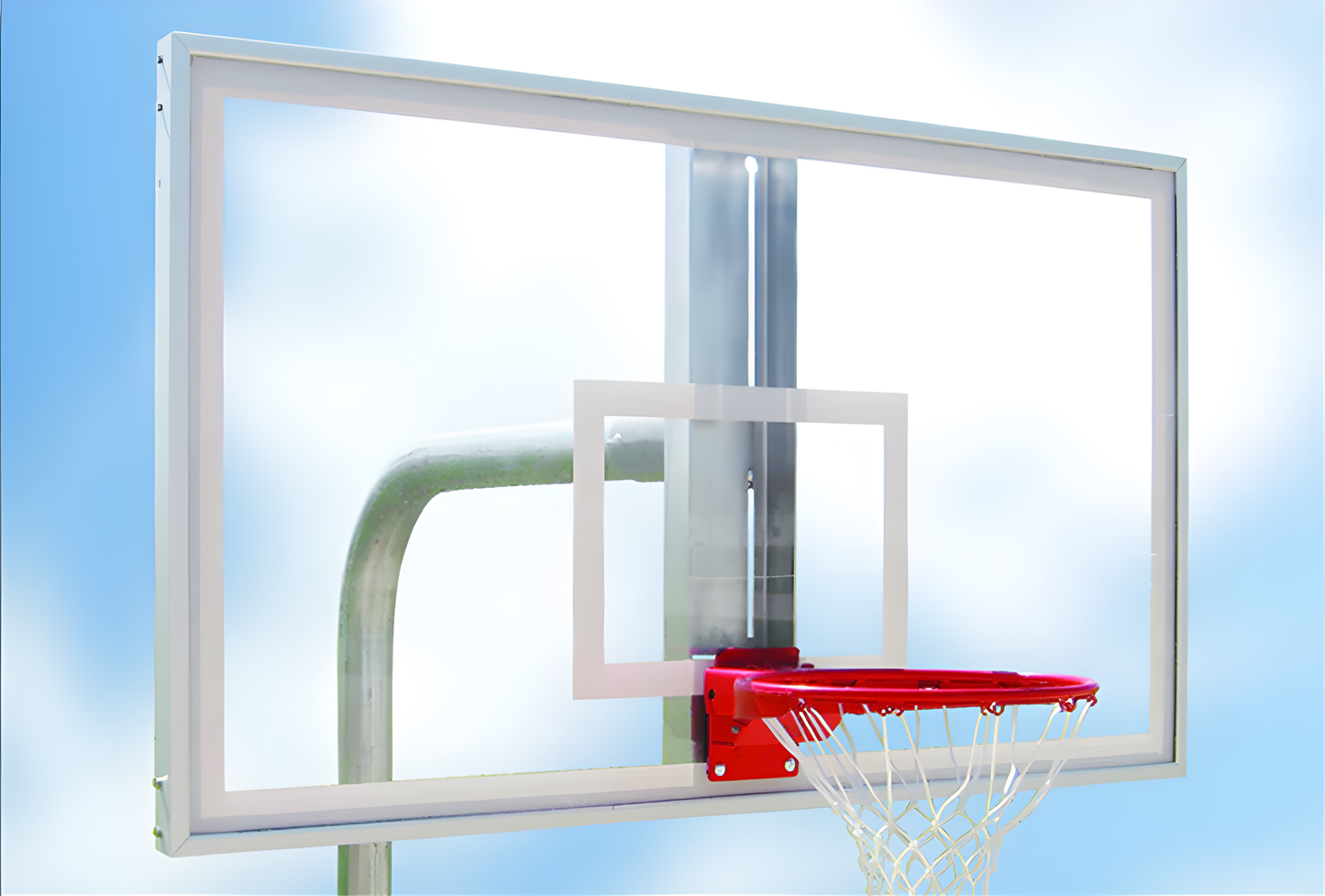FIRST TEAM basketball hoop with clear basketball backboard and red rim mounted on metal pole