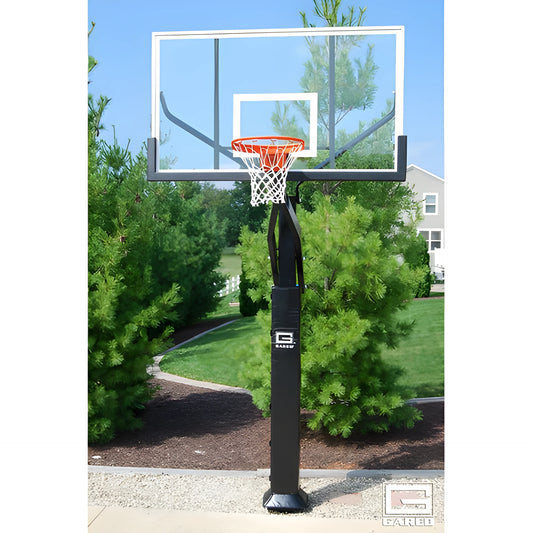 Gared In Ground Basketball Hoop with clear backboard and orange rim installed outdoors on concrete