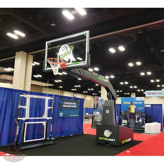 Gared Outer Limit portable basketball hoop with adjustable height in indoor exhibition setting