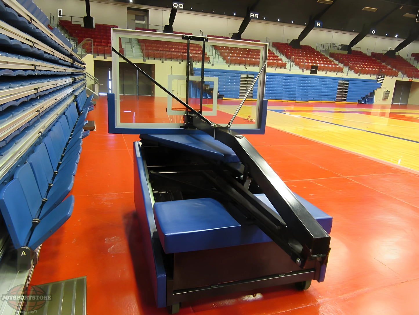 FIRST TEAM portable basketball hoop folded with glass backboard in indoor sports gymnasium