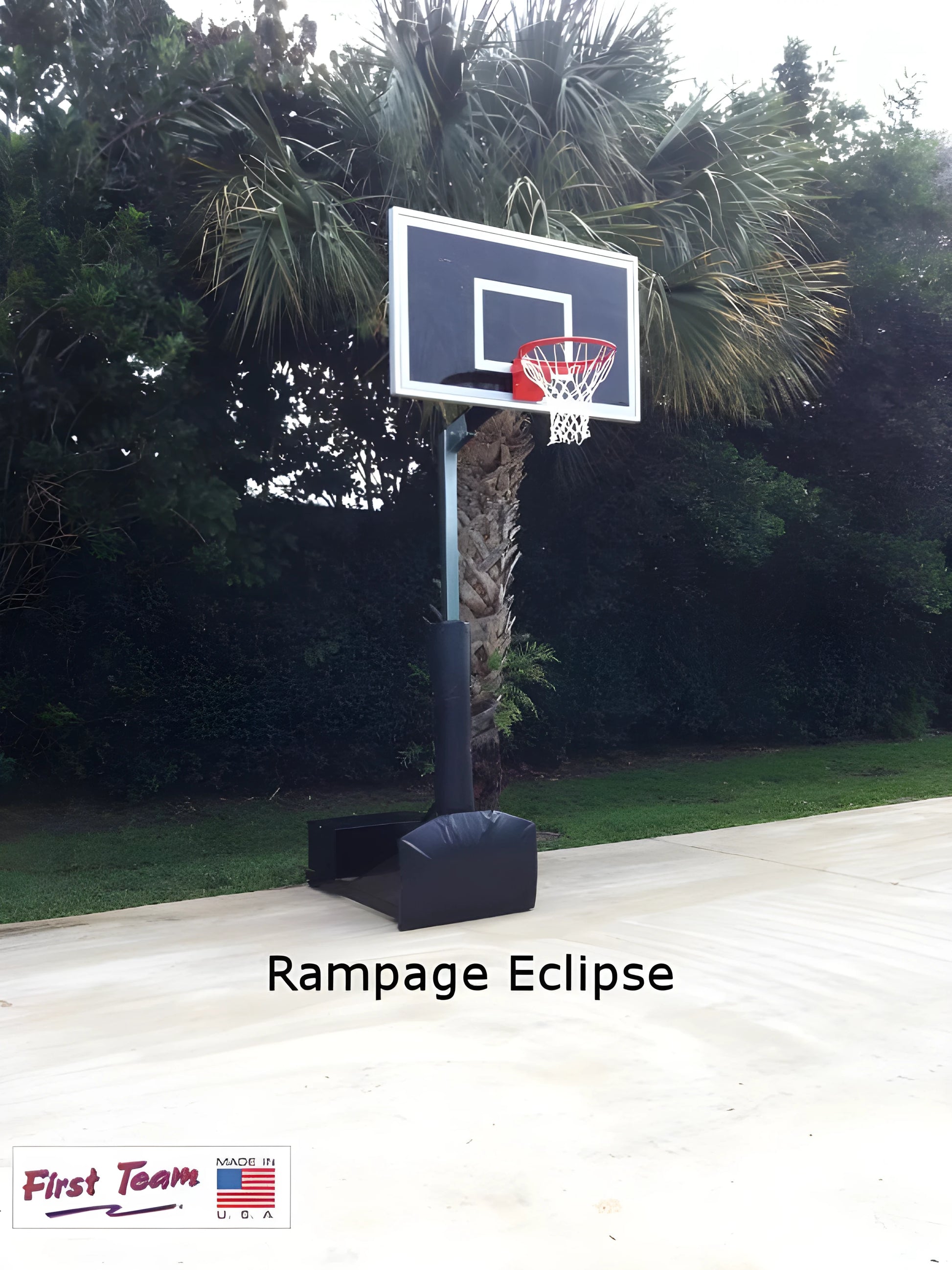 FIRST TEAM Rampage Eclipse portable basketball hoop with black backboard and red rim on outdoor court