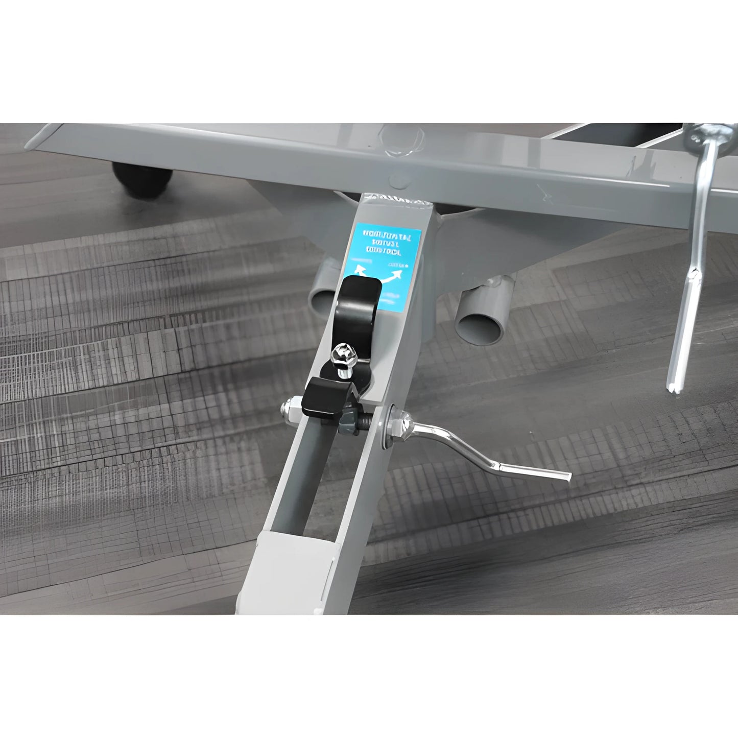 Close-up of Sports Attack Softball Machine's adjustable lever for easy height adjustments
