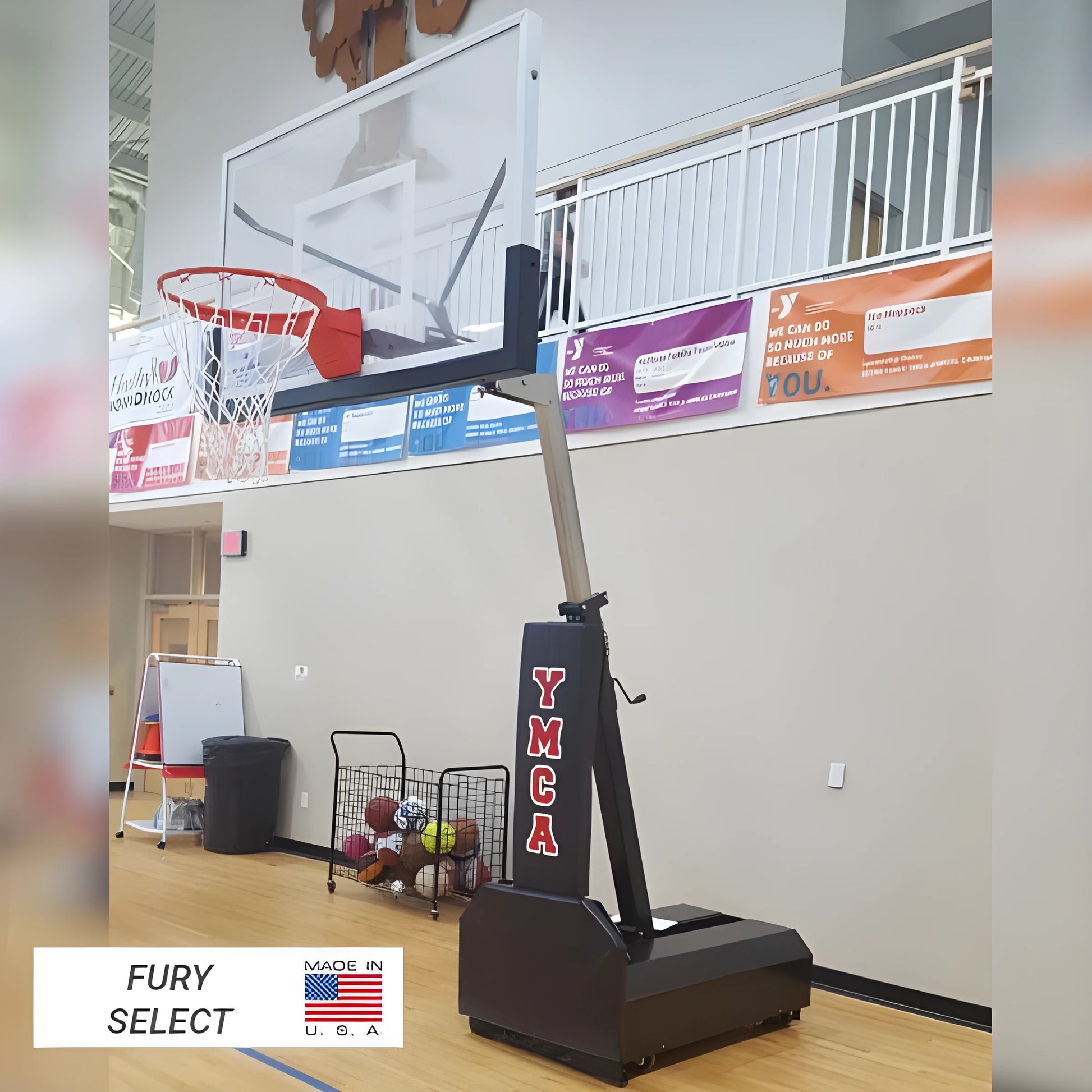 FIRST TEAM portable basketball hoop Fury Select with adjustable height and clear backboard indoor gym setup