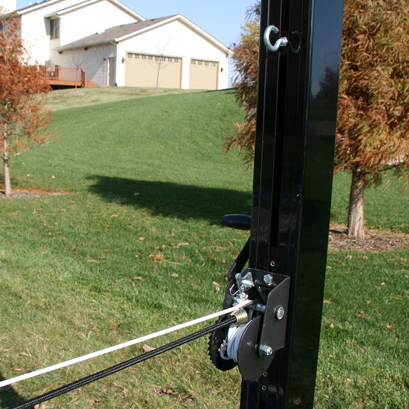 Net tensioning reel mounted in the channel of the Douglas 4 in. square aluminum post