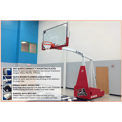 Gared portable basketball hoop with a clear backboard and red base in an indoor gym setting