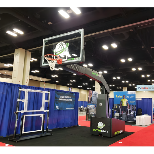 Gared Outer Limit portable basketball hoop with adjustable height in indoor exhibition setting 