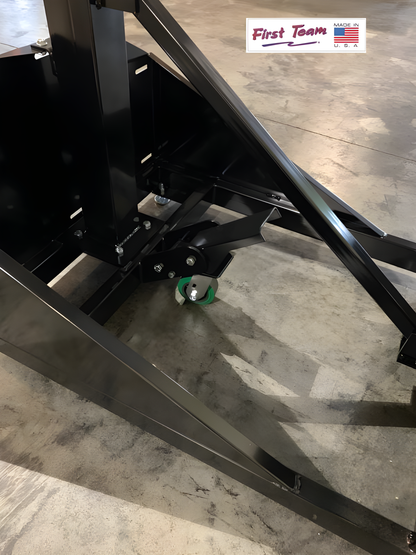 Close-up of FIRST TEAM portable basketball hoop base with support frame and wheel on concrete floor
