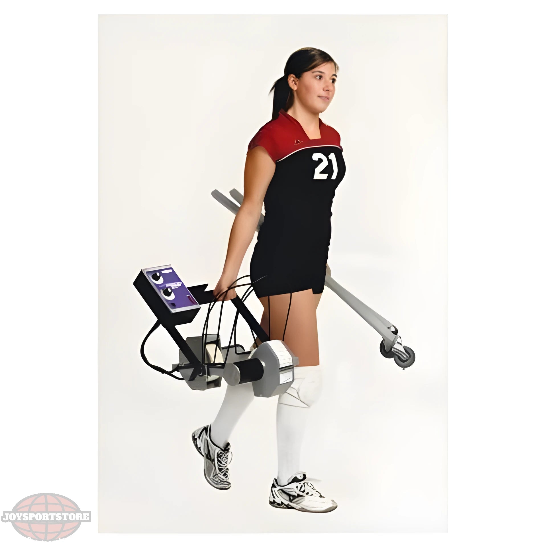 Female athlete carrying a Sports Attack Skill Machine for training and skill development in sports